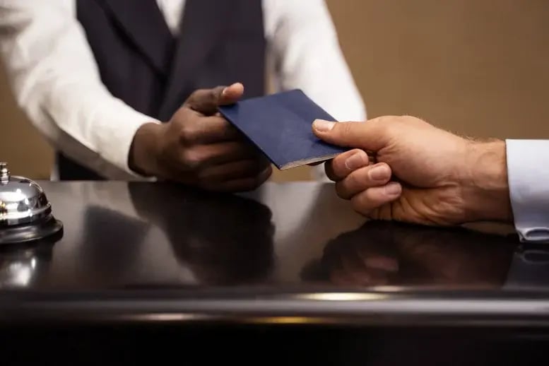 front-view-man-holding-passport